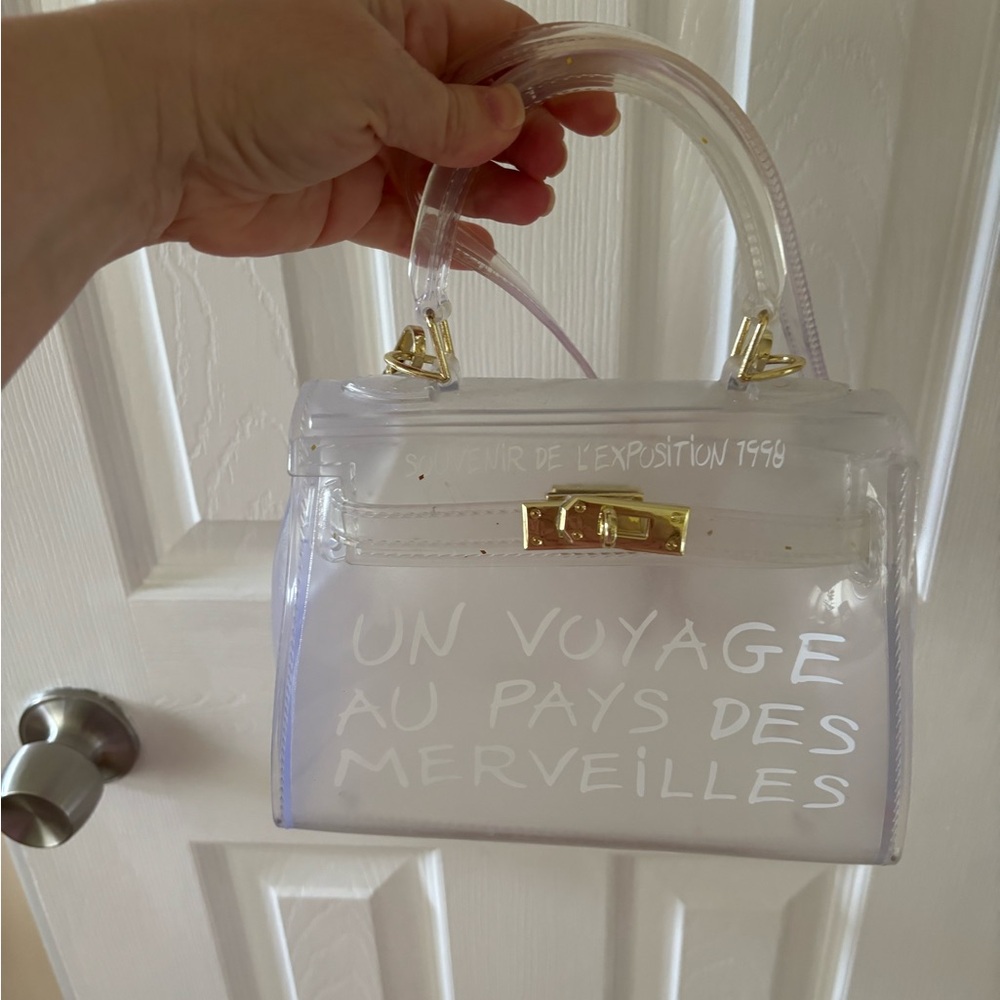 Clear UN VOYAGE AU PAYS DES MERVEILLES BAG
